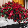 All carnation casket spray any color.  
As shown $210
Medium $185
Small $160